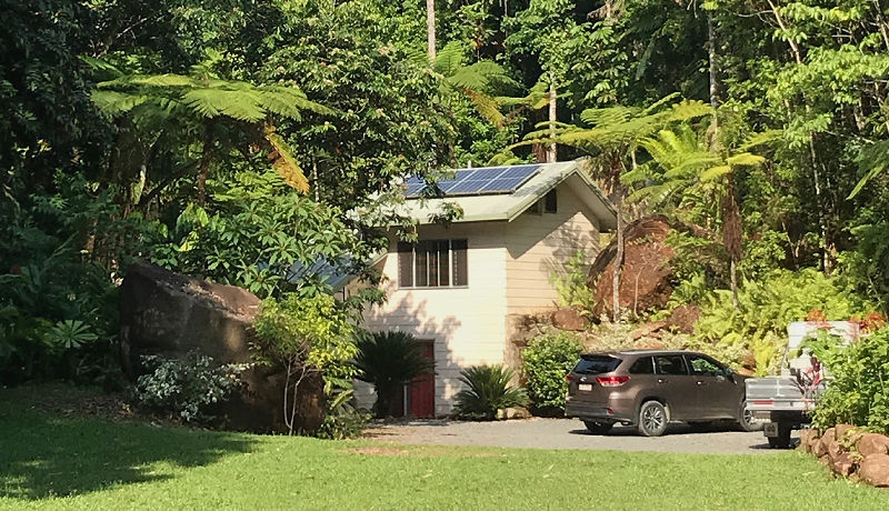 Flat vehicle parking and driveway area at the entrance of Daintree Secrets Rainforest Sanctuary