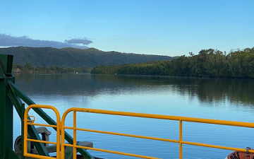 Scenic panoramic view looking down the Daintree River from the vehicle transit ferry crossing towards Cape Tribulation