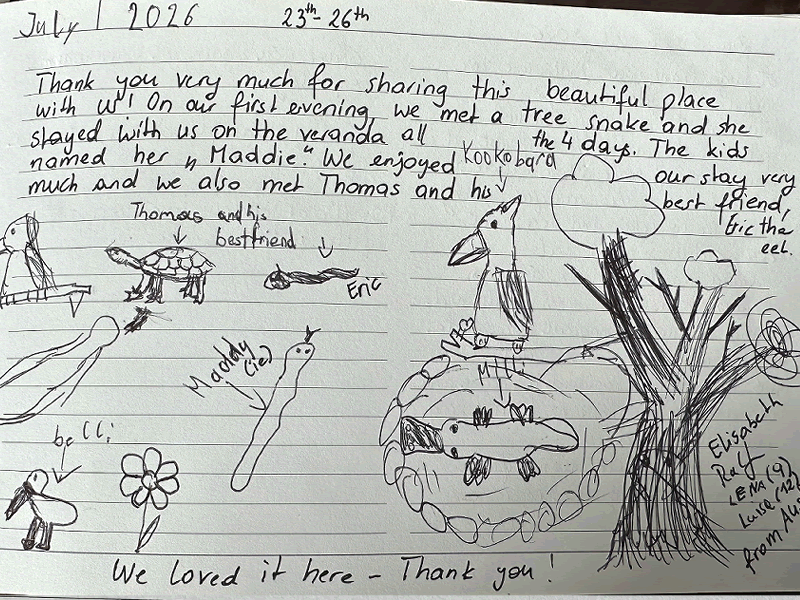 Handwritten holiday home visitor review from July documenting family vacation memories