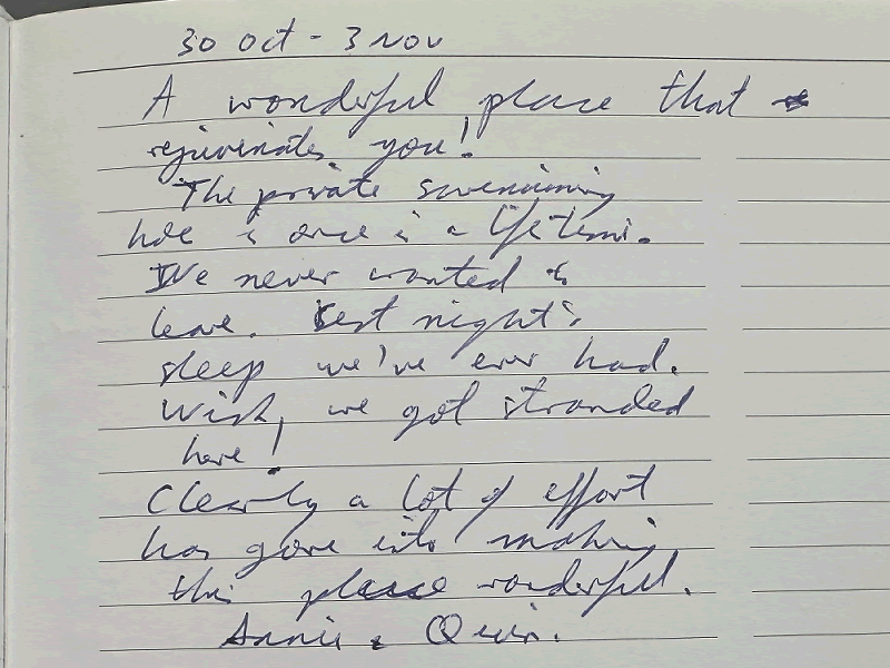 Handwritten guestbook testimonial from October highlighting the private waterfall experience