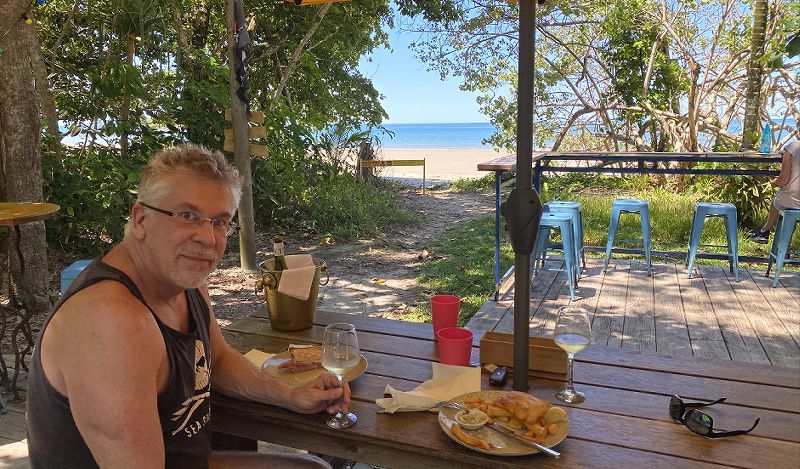 Guests enjoying an outdoor lunch near Noah's Creek at Cape Tribulation Beach